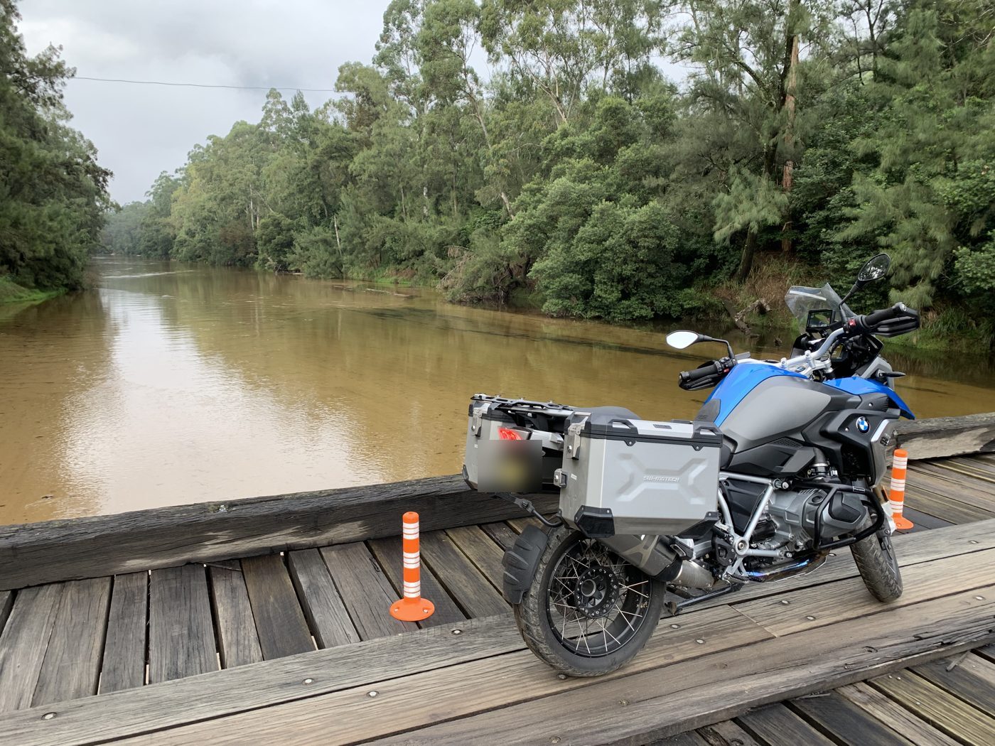 Crossing the river on a timber bridge