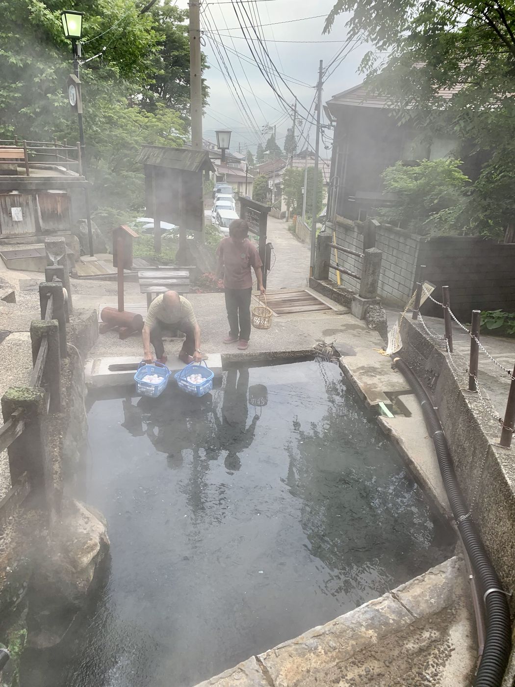 Locals at the hot-spring source in the early morning
