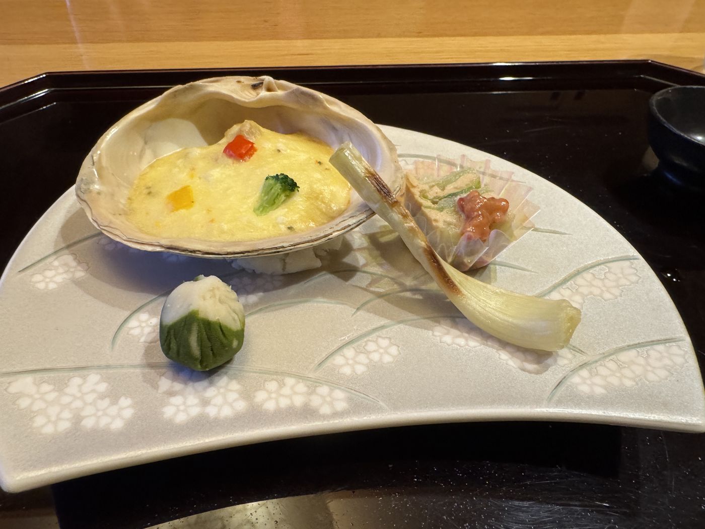 A baked scallop course