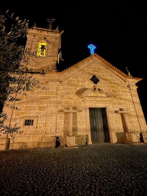 A church lit up at night