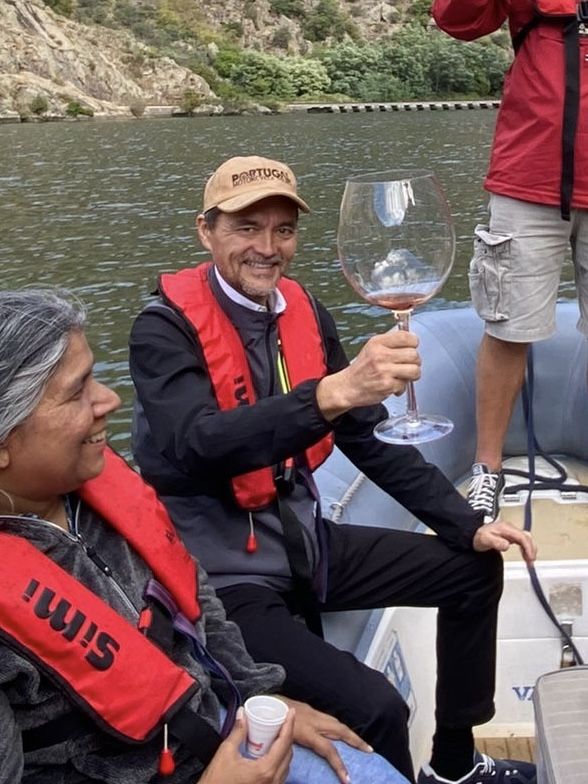 A glass of wine on the river