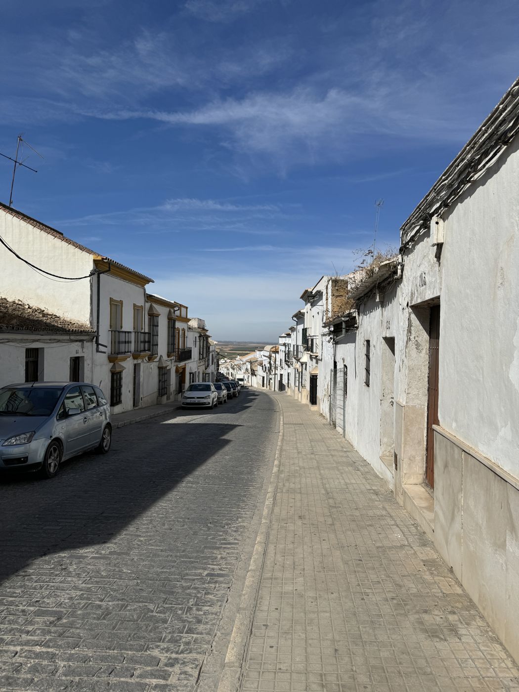 A whitewashed street in Osuna