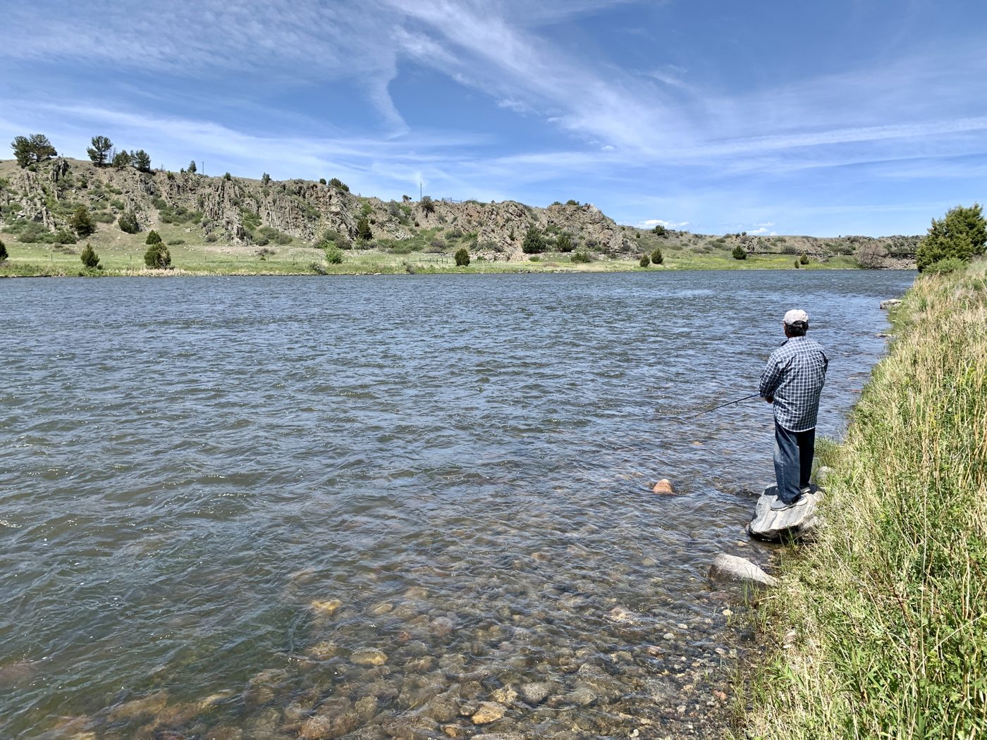 A friend fly fishing on the river
